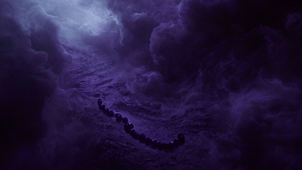 A lone, fractured prayer bead strand dissolving into swirling, dark violet mists.  Celestial light struggles to pierce the gloom, illuminating a desolate, echoing chasm.