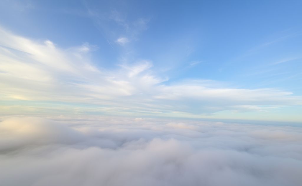 A serene landscape with soft clouds and gentle breezes.