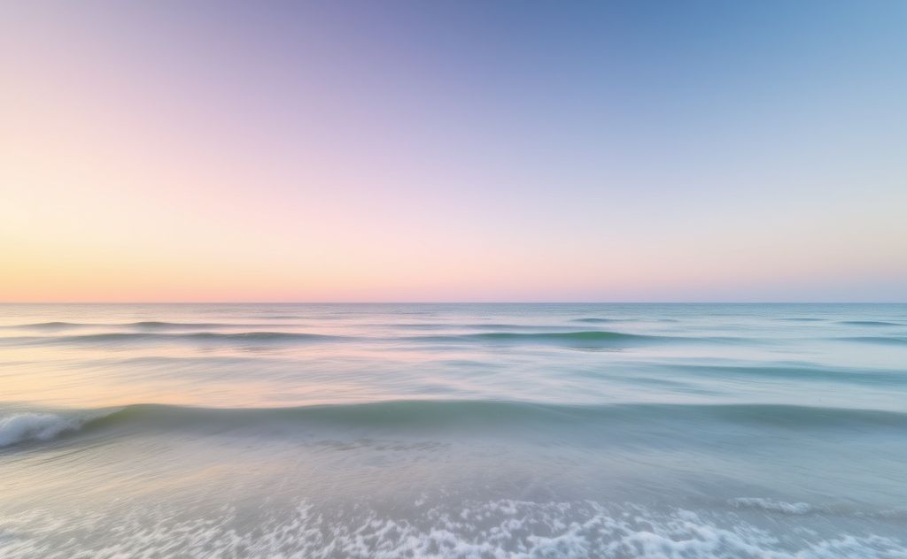A serene landscape with soft colors and gentle waves.