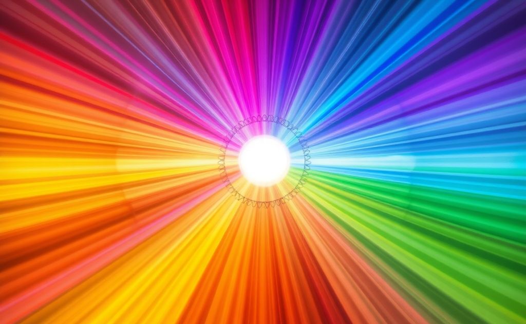 A vibrant spectrum of chakra colors radiating in harmony.