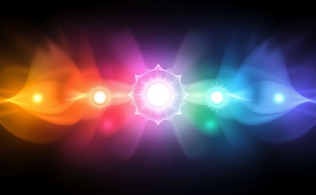 A vibrant spectrum of colors representing chakra energies.