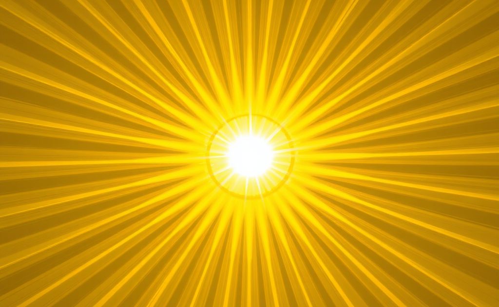 A vibrant yellow sunburst representing the Solar Plexus Chakra.